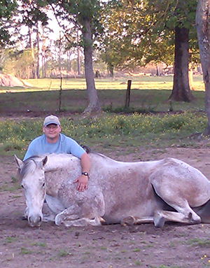 Owner Kevin Russell with White Horse